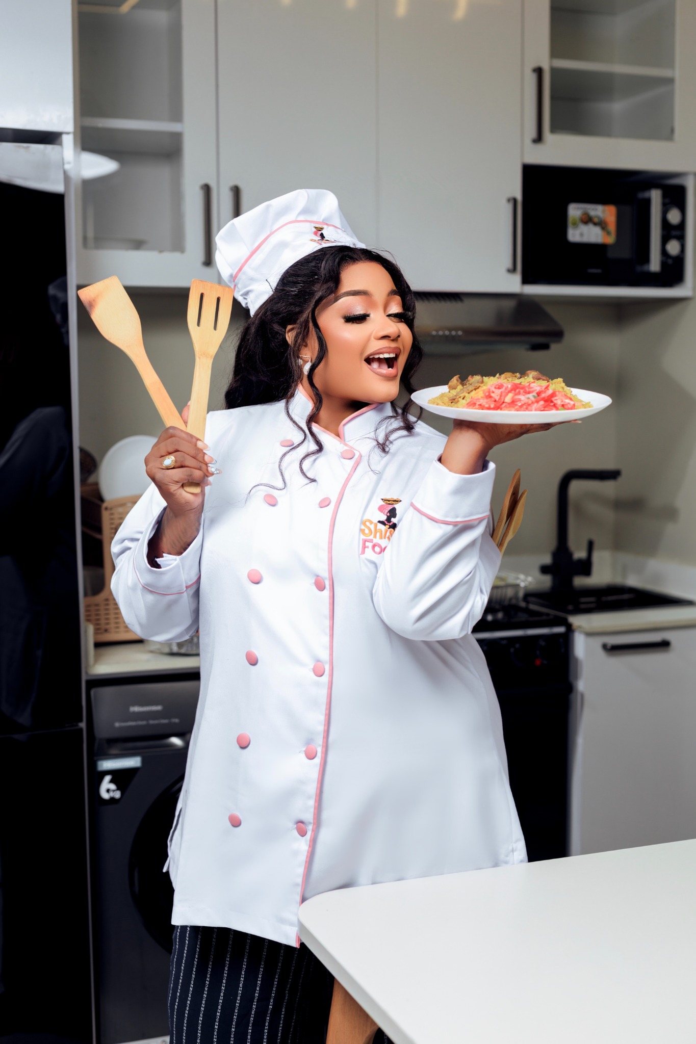 Shishi Food chef serving a dish